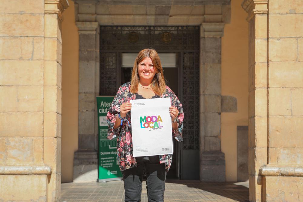 Ribera con el cartel de moda local_1